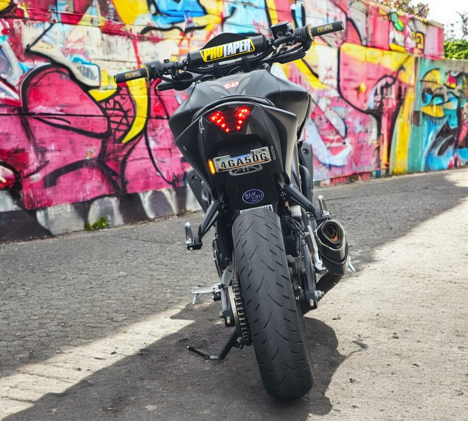 Yamaha MT03 fender eliminator rear view graffiti background